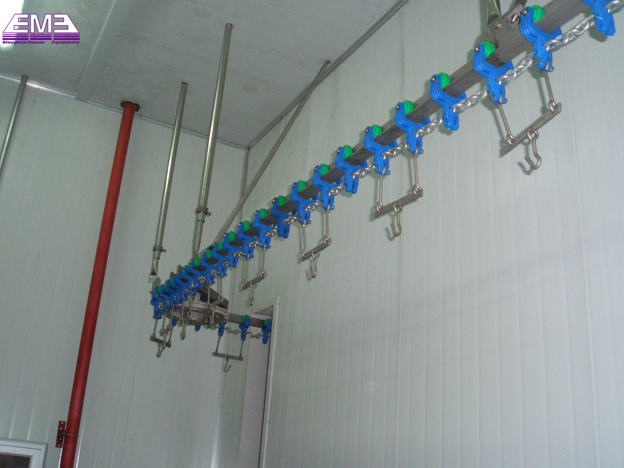 Poultry evisceration and chilling automatic convey rail