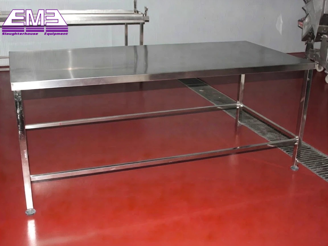 Meat trimming and packaging table